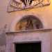 Sulla destra troviamo la piccola chiesa di Santa Lucia: il suo portone color verdone, sovrastato da una raffigurazione della Madonna e da una luminaria, viene aperto solo durante i festeggiamenti di dicembre in onore della santa